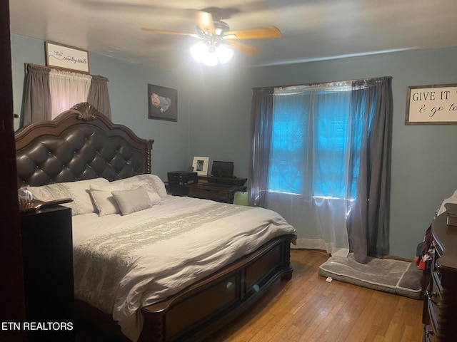 189 Bacon St, Jellico, TN 37762 - bedroom featuring hardwood / wood-style flooring and a ceiling fan
