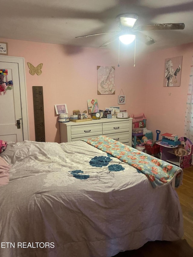 189 Bacon St, Jellico, TN 37762 - bedroom with wood finished floors and ceiling fan