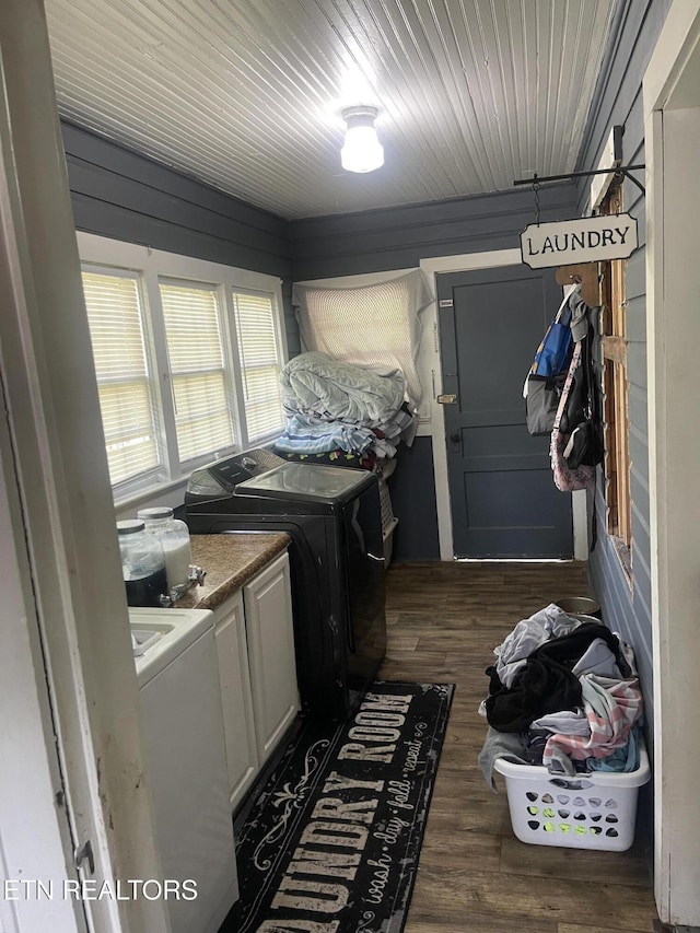 189 Bacon St, Jellico, TN 37762 - laundry area with cabinet space, independent washer and dryer, and dark wood-style flooring