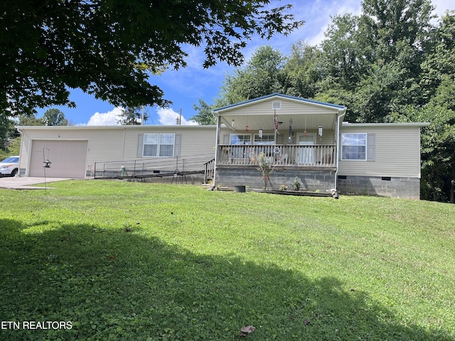 142 Lone Holly Ln, New Tazewell, TN 37825 - manufactured / mobile home with crawl space, an attached garage, a porch, and a front lawn