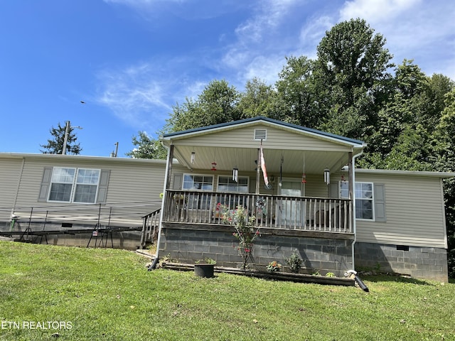 142 Lone Holly Ln, New Tazewell, TN 37825 - manufactured / mobile home featuring crawl space, a porch, and a front lawn