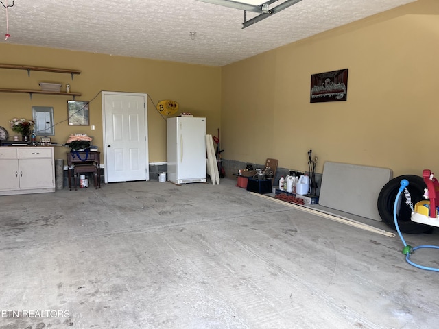 142 Lone Holly Ln, New Tazewell, TN 37825 - garage with freestanding refrigerator