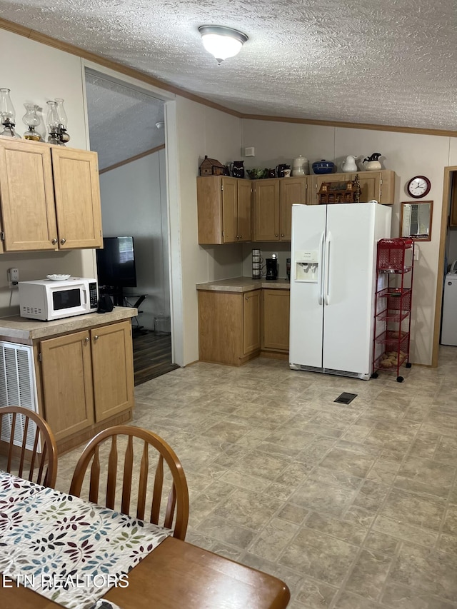 142 Lone Holly Ln, New Tazewell, TN 37825 - kitchen with white appliances, ornamental molding, light countertops, washer / dryer, and a textured ceiling