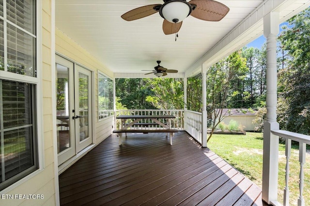 440 Indian Hills Rd, Oneida, TN 37841 - wooden porch with ceiling fan, french doors, and a yard