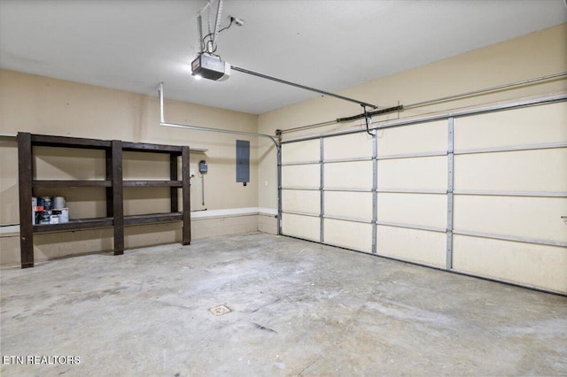 440 Indian Hills Rd, Oneida, TN 37841 - garage with electric panel and a garage door opener