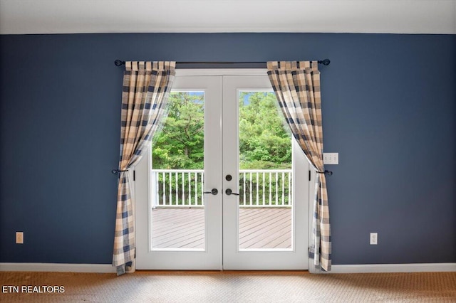 440 Indian Hills Rd, Oneida, TN 37841 - entryway with carpet flooring and french doors