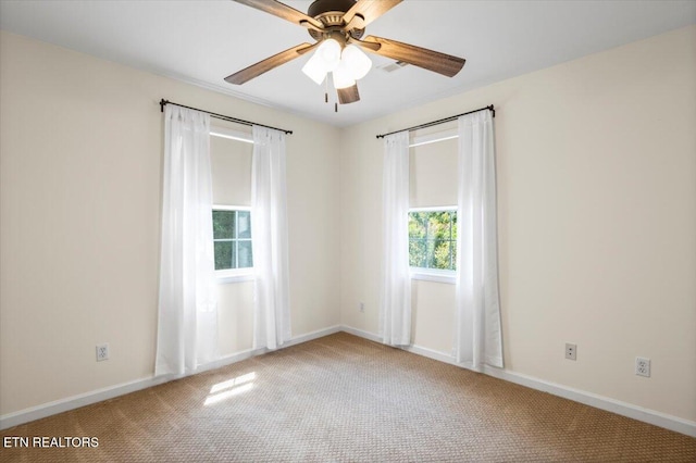 440 Indian Hills Rd, Oneida, TN 37841 - carpeted empty room featuring a ceiling fan and baseboards