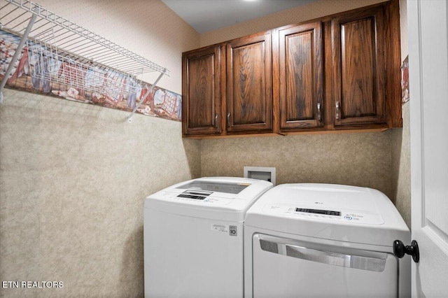 440 Indian Hills Rd, Oneida, TN 37841 - laundry room featuring washing machine and clothes dryer and cabinet space