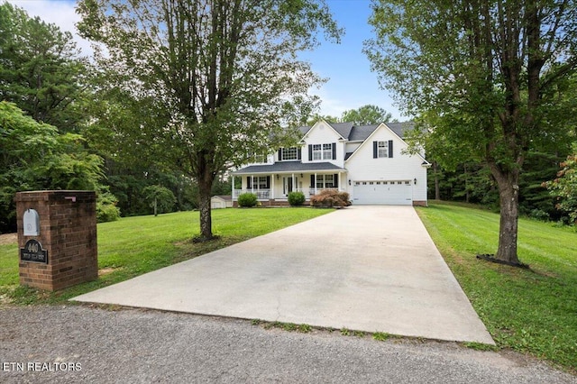 440 Indian Hills Rd, Oneida, TN 37841 - view of front of home with a porch, driveway, and a front yard