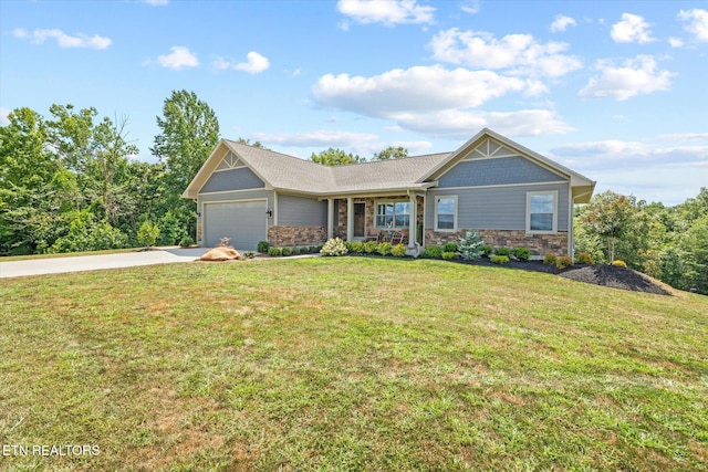 1721 Holly Bend Dr, Byrdstown, TN 38549 - craftsman-style house featuring driveway, stone siding, an attached garage, and a front lawn