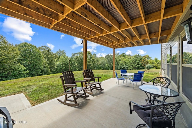 1721 Holly Bend Dr, Byrdstown, TN 38549 - view of patio with outdoor dining space and view of scattered trees