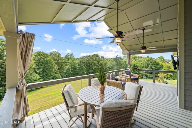 1721 Holly Bend Dr, Byrdstown, TN 38549 - deck featuring a ceiling fan and a yard