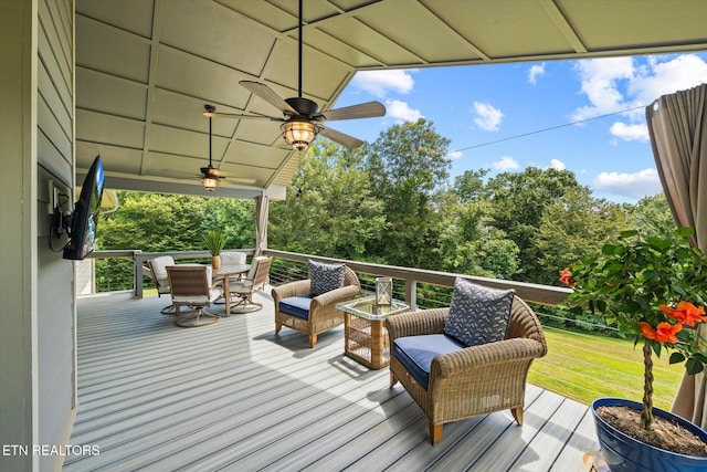 1721 Holly Bend Dr, Byrdstown, TN 38549 - deck featuring ceiling fan and a lawn