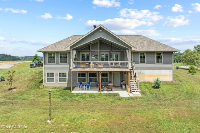 1721 Holly Bend Dr, Byrdstown, TN 38549 - rear view of house with stairway, a patio area, a lawn, a deck, and a ceiling fan