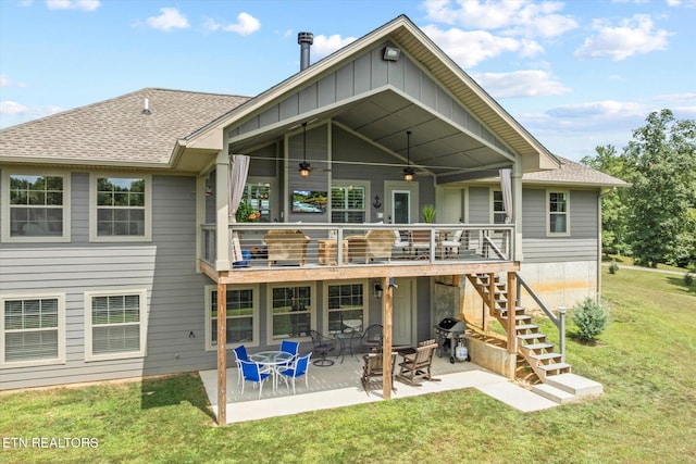 1721 Holly Bend Dr, Byrdstown, TN 38549 - rear view of property with a lawn, stairway, a ceiling fan, a patio area, and roof with shingles