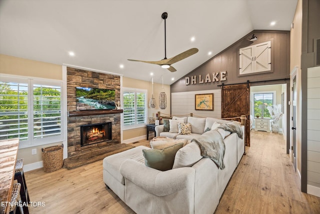 1721 Holly Bend Dr, Byrdstown, TN 38549 - living room featuring a barn door, wood finished floors, plenty of natural light, ceiling fan, and recessed lighting