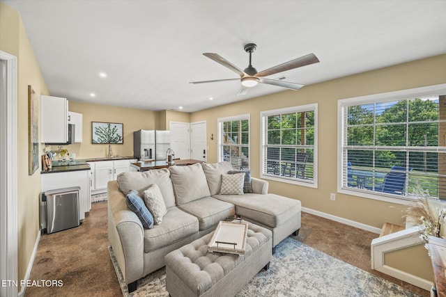 1721 Holly Bend Dr, Byrdstown, TN 38549 - carpeted living area featuring ceiling fan, plenty of natural light, and recessed lighting