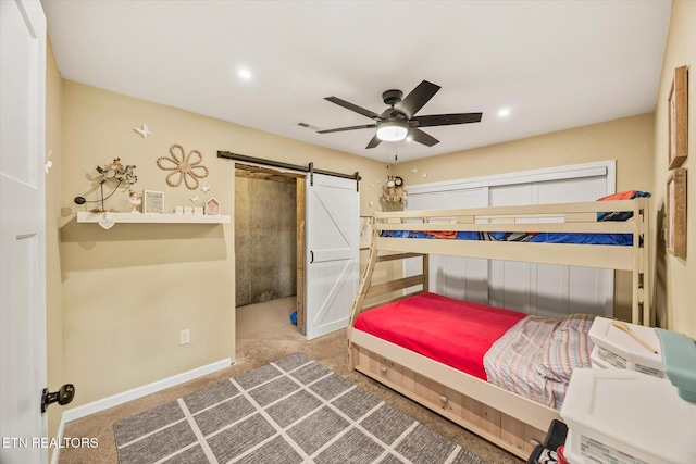 1721 Holly Bend Dr, Byrdstown, TN 38549 - bedroom with a barn door, recessed lighting, and a ceiling fan