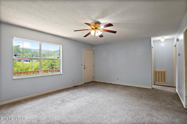 546 Park Rd, Caryville, TN 37714 - carpeted empty room with a ceiling fan and a textured ceiling