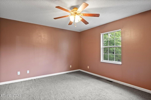 546 Park Rd, Caryville, TN 37714 - carpeted spare room with ceiling fan and a textured ceiling