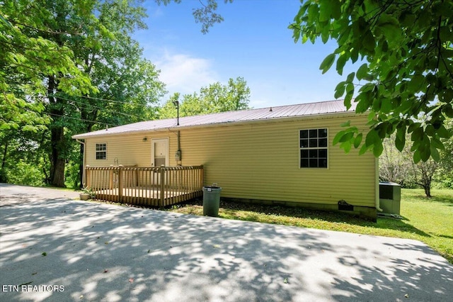 546 Park Rd, Caryville, TN 37714 - view of home's exterior with a deck and a metal roof