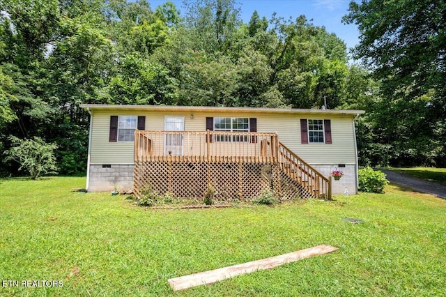546 Park Rd, Caryville, TN 37714 - view of front of house with crawl space, a front lawn, stairway, and a deck