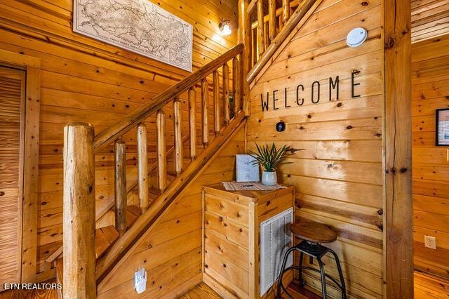 3322 Covered Bridge Way, Sevierville, TN 37862 - staircase featuring wood walls