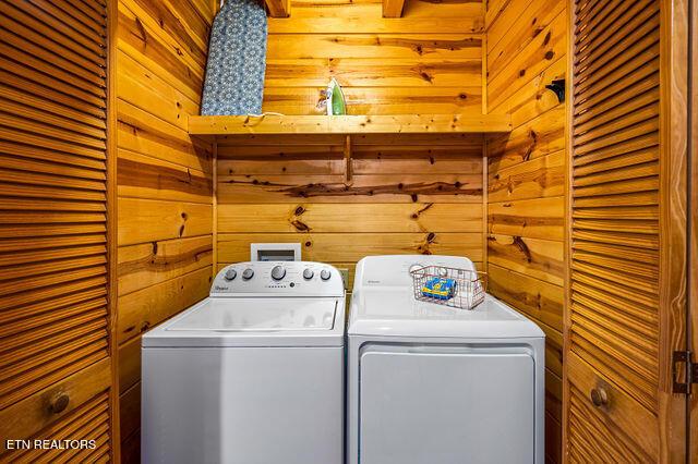 3322 Covered Bridge Way, Sevierville, TN 37862 - washroom with washer and dryer and wood walls
