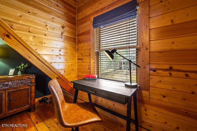 3322 Covered Bridge Way, Sevierville, TN 37862 - office area with wooden walls and wood-type flooring