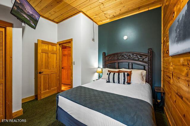 3322 Covered Bridge Way, Sevierville, TN 37862 - bedroom with carpet and wood ceiling