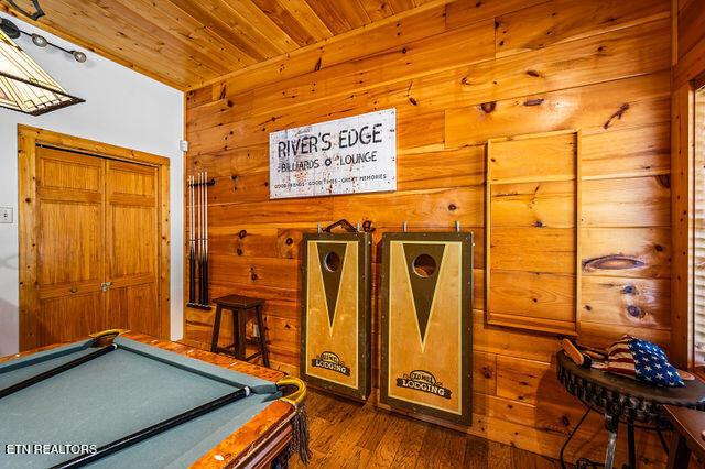 3322 Covered Bridge Way, Sevierville, TN 37862 - game room featuring wooden ceiling, wood walls, billiards table, and wood finished floors