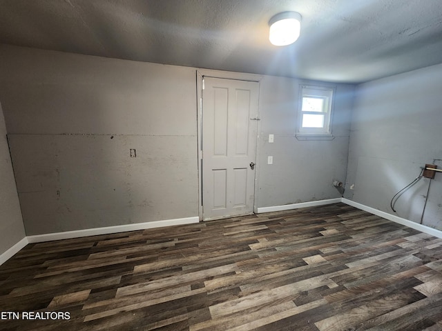 308 E Prospect St, Lafollette, TN 37766 - below grade area with wood finished floors and baseboards