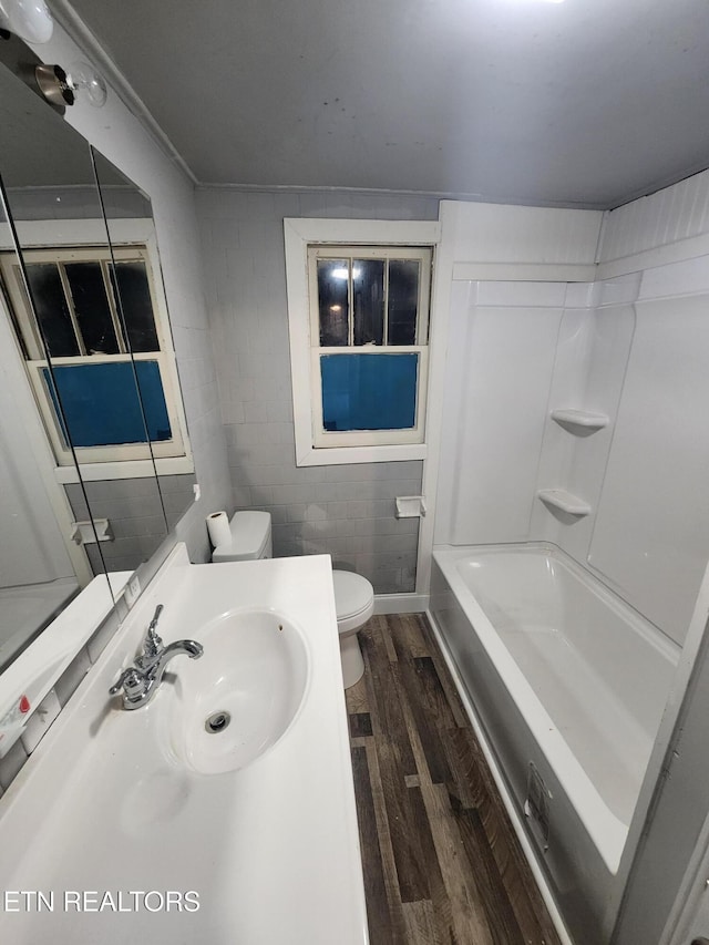 308 E Prospect St, Lafollette, TN 37766 - full bathroom with wood finished floors and vanity