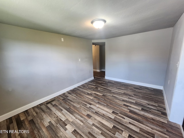 308 E Prospect St, Lafollette, TN 37766 - spare room featuring dark wood finished floors