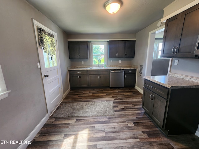 308 E Prospect St, Lafollette, TN 37766 - kitchen featuring dishwasher, dark wood-style floors, and light countertops