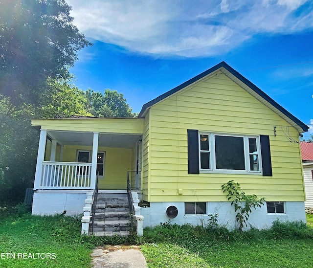 308 E Prospect St, Lafollette, TN 37766 - view of front of house with covered porch