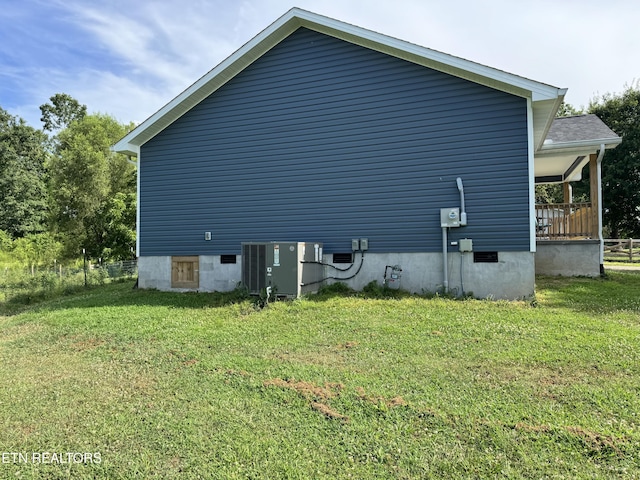 1353 Roy Owens Rd, Jamestown, TN 38556 - view of property exterior with a lawn and a central air condition unit