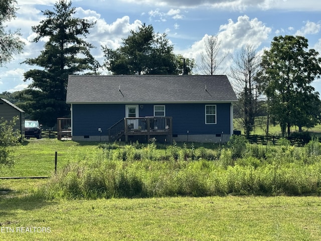 1353 Roy Owens Rd, Jamestown, TN 38556 - back of property featuring crawl space, a deck, and a lawn
