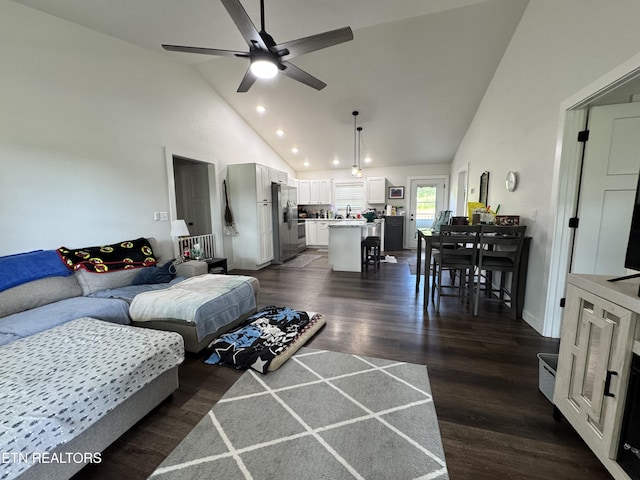 1353 Roy Owens Rd, Jamestown, TN 38556 - living room with high vaulted ceiling, dark wood-style floors, ceiling fan, and recessed lighting