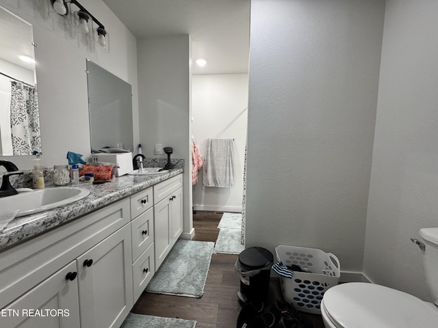 1353 Roy Owens Rd, Jamestown, TN 38556 - bathroom featuring double vanity and wood finished floors