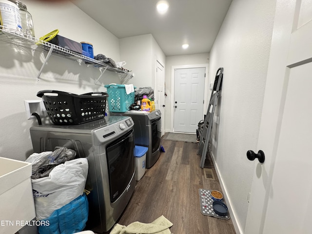 1353 Roy Owens Rd, Jamestown, TN 38556 - washroom with washer and clothes dryer and dark wood-style flooring