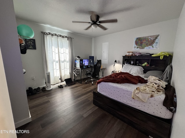 1353 Roy Owens Rd, Jamestown, TN 38556 - bedroom featuring wood finished floors, a ceiling fan, and electric panel