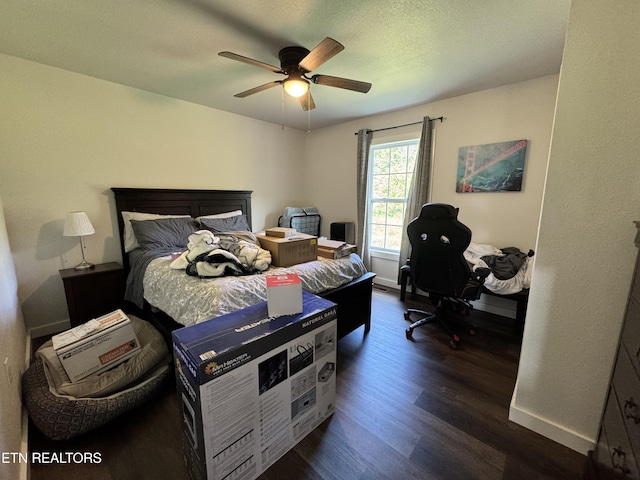 1353 Roy Owens Rd, Jamestown, TN 38556 - bedroom featuring dark wood-style flooring and a ceiling fan