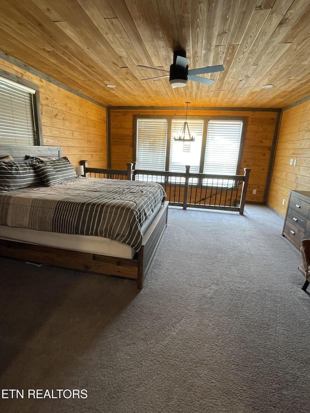 1908 Inskip Ln, Dandridge, TN 37725 - bedroom with wood ceiling, wooden walls, and carpet flooring