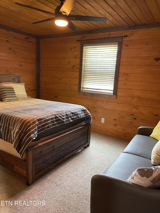 1908 Inskip Ln, Dandridge, TN 37725 - carpeted bedroom featuring wooden walls, wood ceiling, and a ceiling fan