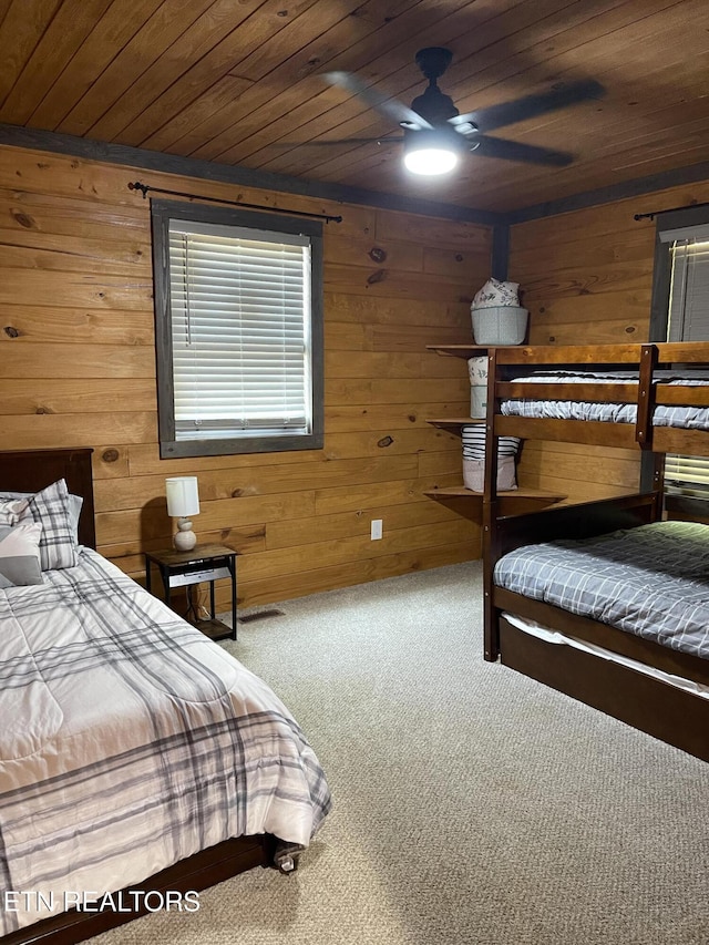 1908 Inskip Ln, Dandridge, TN 37725 - bedroom featuring wood ceiling, carpet floors, and wooden walls