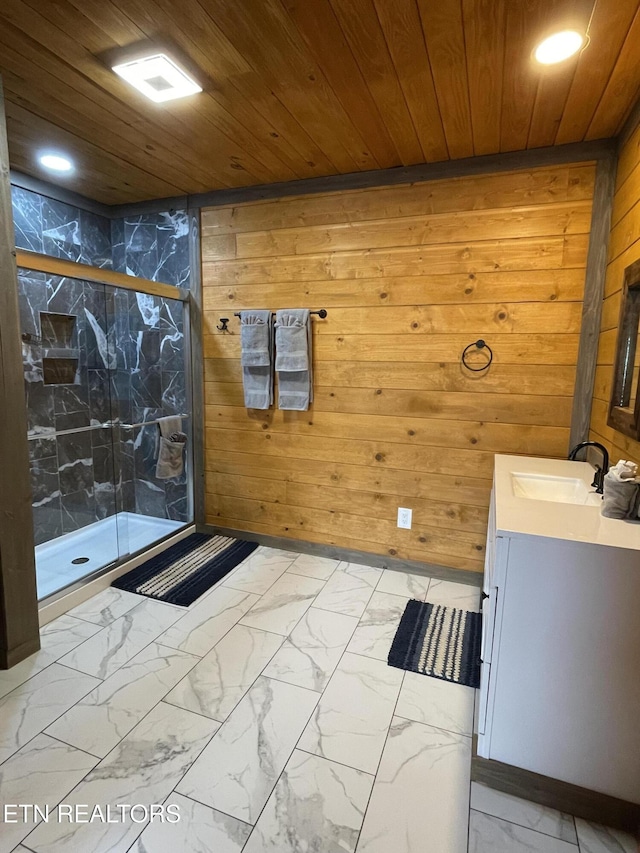 1908 Inskip Ln, Dandridge, TN 37725 - full bath featuring marble look tiles, wooden ceiling, wooden walls, vanity, and a stall shower