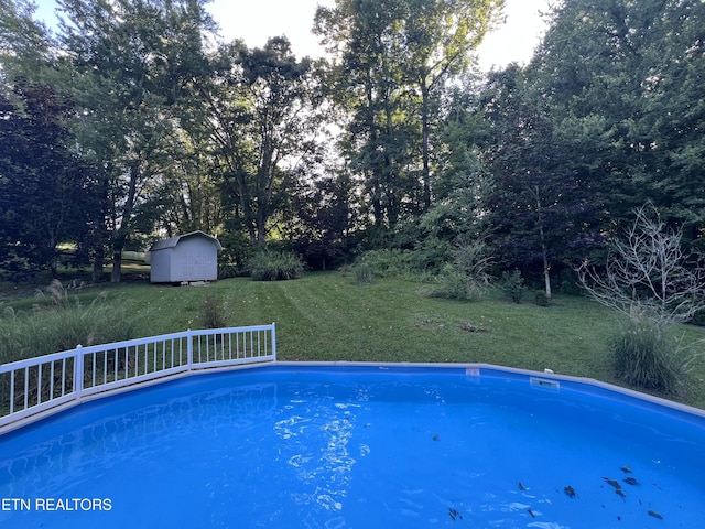 2011 Cedar Ln, Corbin, KY 40701 - swimming pool with a storage shed and a lawn