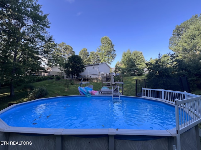 2011 Cedar Ln, Corbin, KY 40701 - outdoor pool with a wooden deck and a yard