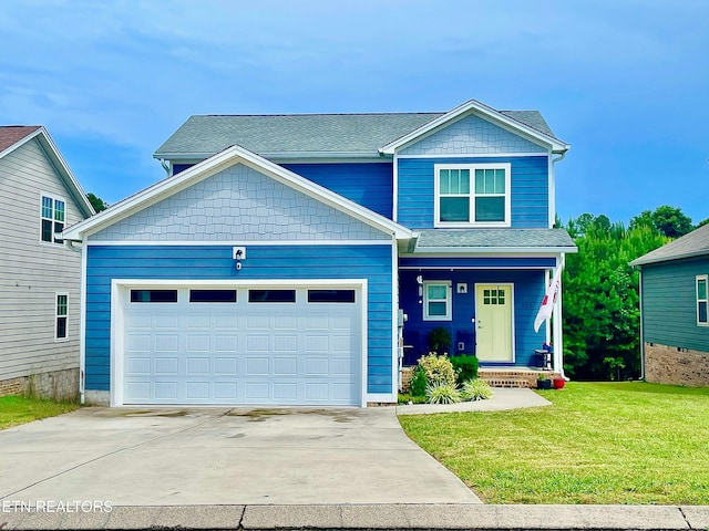 122 SW Winesap Way, Cleveland, TN 37311 - view of front of property featuring driveway, roof with shingles, and a front lawn
